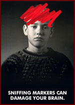 picture of boy with red marker on head