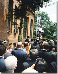 a flag-raising ceremony at the Iraqi Embassy