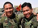 U.S. Navy Petty Officers 1st Class Roseller Flores And Alexis Flores