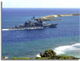 The  USS Vincennes (CG 49) makes her way through Apra Harbor, Guam, for a port visit.