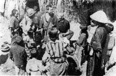 Japanese civilians with U.S soldiers