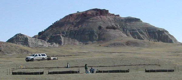 USGS personnel collecting data at a grasslands site near Sheep Butte, ND