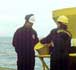 Photograph of offshore inspectors.