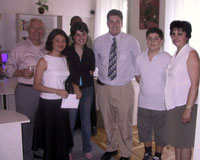 The U.S. Embassy's Public Affairs representative, Aron Liptak, standing with audience members and American Corner staff following his presentation on the development of the U.S. Constitution