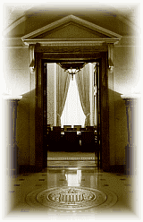 Photograph of open entryway to the Board Room links to page that describes the room
