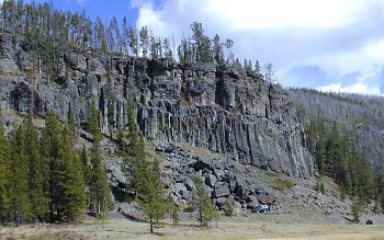 Photograph of Obsidian Cliff a lava flow erupted about 180,000 years ago.