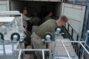 Marines from 2nd Battalion, 4th Marine Regiment unload and inventory a truckful of medical supplies for the Ar Ramadi General Hospital. Basic medical equipment totalling nearly $50,000 was donated to the hospital in order to equip the doctors there to better help the people of Ar Ramadi.
(USMC photo by Cpl. Paula M. Fitzgerald) Photo by: Cpl. Paula M. Fitzgerald