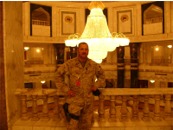 A Marine poses in a Palace; click here to enlarge photo