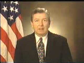 Picture of Attorney General John Ashcroft linking to the text of his speech on Computer Crime
