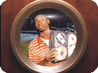 African american boy at front door with music CDs