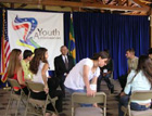 Secretary Powell speaks with students at the US Embassy in Brasilia. The students are part of the Brazilian Youth Ambassadors Program. State Department Photo. 