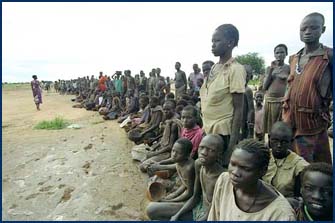 Sudanese villagers await relief