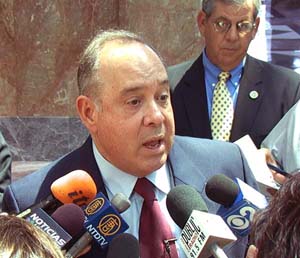 USCIS Director Eduardo Aguirre addressed the media following the naturalization of 200 new citizens at a ceremony held on Thursday, July 1, 2004 at the Harold Washington Library in Chicago.  The 200 new Americans sworn-in at the Chicago ceremony were part of 16,000 new citizens welcomed during July 4th USCIS naturalization ceremonies across the country.
