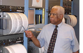 Waverly Person of the U.S.G.S. showing a recording of a large earthquake.