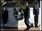 President George W. Bush and Coretta Scott King, left, participate in a wreath lay ceremony at the grave of Dr. Martin Luther King JR. in Atlanta, Georgia, Thursday, Jan. 15, 2004. White House photo by Eric Draper.
