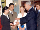 Secretary Powell with Kyleigh Kuhn, Founder of Pennies for Peace. State Department photo by Michael Gross.