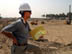 An Iraqi civil engineer working for a USAID contractor surveys the site preparation for an extension to the Saba Nissan water Treatment plant as part of a $15 million dollar grant to expand drinking water for the Baghdad region.