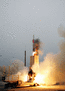 An Arrow anti-ballistic missile interceptor rises on a column of fire.