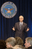 Secretary of the Navy Gordon England speaks to the audience at a Pentagon town hall meeting.