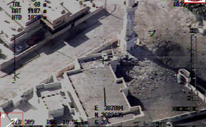 An aerial photo taken shortly after Marines called in close-air support to breach a wall surrounding a mosque shows the accuracy of the laser-guided bomb.  Marines were under attack from enemy forces using the protected site as a platform from which to fire on advancing Marines.  Marines blasted the wall and killed attackers inside.
(Official Department of Defense photo) Photo by: Official Department of Defense photo