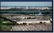 Aerial view of the Pentagon, with the Potomac River and Washington, DC, in the background.