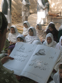 Women study in an accelerated learning program for out-of-school students