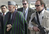 President Karzai, left, and members of the DS-led protective detail.