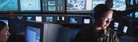 Photo of an Army Reserve Soldier in a control room.