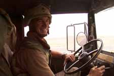 Sgt. Marc Litalien is one of 30 drivers in a supply convoy heading toward Baghdad to support frontline troops.  The 1058th Transportation Company, out of Hingham, has been deployed to the Middle East for two months.