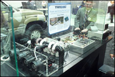 An engineer from the Armys Tank and Automotive Command shows off the laser weapon mock-up at the Association of the U.S. Army annual meeting in Washington, D.C., Oct. 6. 