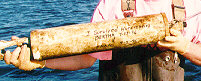 person holding salinity monitor