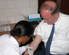 Ambassador Randall Tobias, U.S. Global AIDS Coordinator gets tested for HIV/AIDS [State Department photo]