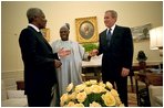 President George W. Bush hosts a visit by United Nations Secretary General Kofi Annan and Nigerian President Olusegun Obasanjo to the Oval Office May 11, 2001. President Bush discussed a strategy to halt the spread of AIDS and other infectious diseases across the African continent and the world. President Bush pledged U.S. support for the Global HIV/AIDS fund and jump-started the fund with the first contribution. The United States is the largest major contributor to the fund, which has now reached $500 million.