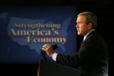 President George W. Bush speaks to the Economic Club of Chicago, Ill., about his growth and jobs plan to strengthen the American economy Tuesday, January 7, 2003.