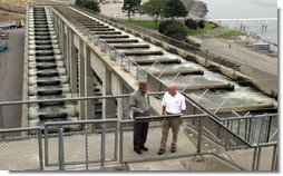 President George W. Bush talks with Witt Anderson during a tour of the Ice Harbor Lock and Dam in Burbank, Wash., Friday,August 22, 2003. White House photo by Paul Morse.