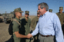 Deputy Secretary Wolfowitz shakes the hand of Lance Corporal Robert A. James.