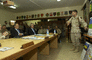 Secretary Rumsfeld receives a briefing from the Commander of the 1st Infantry Division in Kirkuk, Iraq.