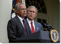 Standing with President George W. Bush, Rep. Porter Goss, R-Fla., addresses the media after the President nominated him to be the director of the CIA in the Rose Garden, Tuesday, Aug. 10, 2004.  White House photo by Joyce Naltchayan.