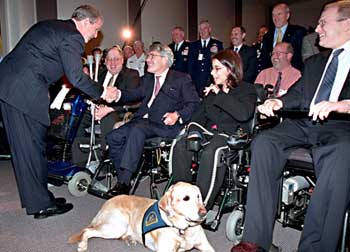 President Bush greets people after speech