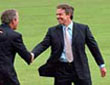 Photo of Prime Minister Tony Blair shaking hands with President George Bush