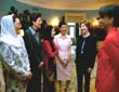 Photo of Afghan Women's Council with First Lady Laura Bush.