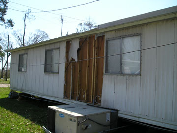 Damage to wall of senior mobile home after Hurricane Ivan (Pensacola, FL)