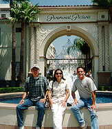 Interns sit on fountain near entrance of Paramount Studios.