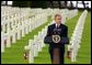 President George W. Bush gives a Memorial Day speech at the Normandy American Cemetery at Normandy Beach in France on May 27, 2002. White House photo by Paul Morse.