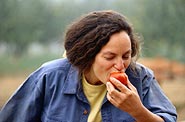 adult eating fruit