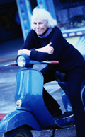 Image of a woman on a scooter