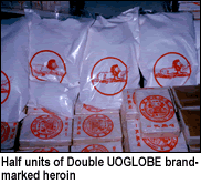 photo - half units of Double UOGLOBE brand-marked heroin