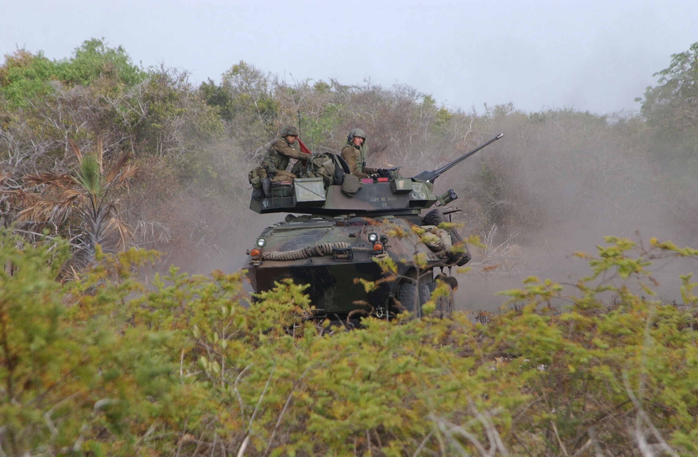 A Light Armored Vehicle from, Charlie Company, 1st Light Armored Reconnaissance Battalion, 13th Marine Expeditionary Unit (Special Operations Capable) moves down range during a live fire exercise during Exercise Edged Mallet, Manda Bay Naval Base, Lamu, Kenya, February 9, 2002.  Official USMC Photo (Released) Photo by: LCpl Daniel Kelly 