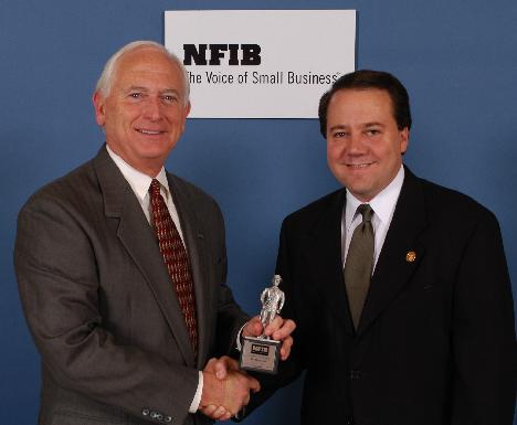 Congressman Pat Tiberi receives the 'Guardian of Small Business' award from Jack Faris (L), President of the National Federation of Independent Business.  The NFIB noted Tiberi's 100% voting record in the 108th Congress on issues of importance to small businesses and their employees.