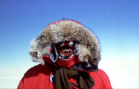 Working on the East Antarctic Polar Plateau requires extreme protection against the cold and wind. This was the author's daily working garb during a two-month search for meteorites.